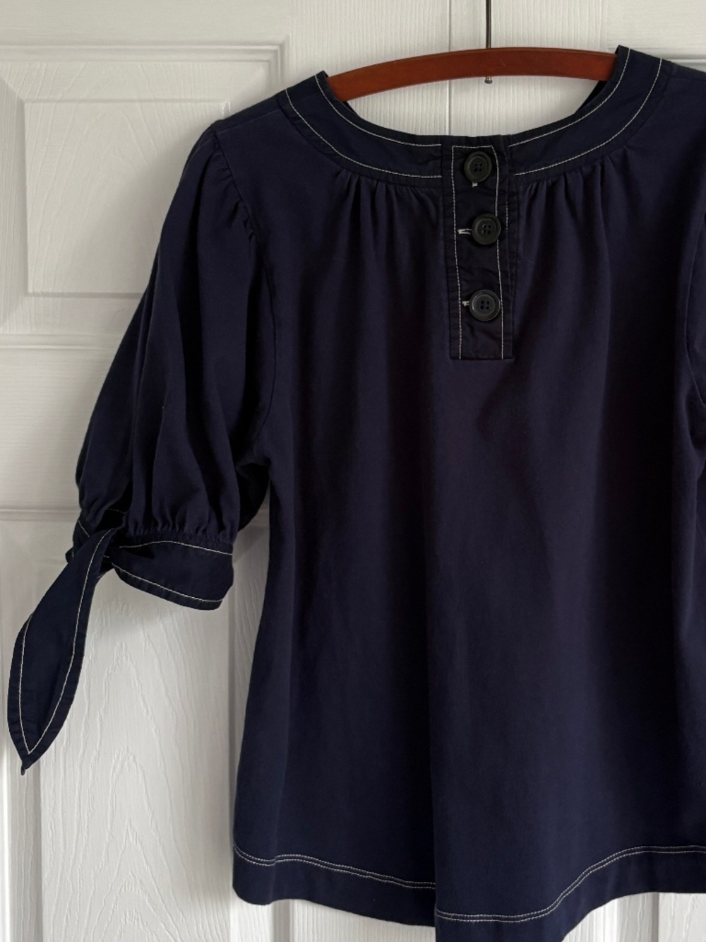 Anthropologie Navy Puff Sleeve Top Tie Cuffs Contrast Stitch Henley